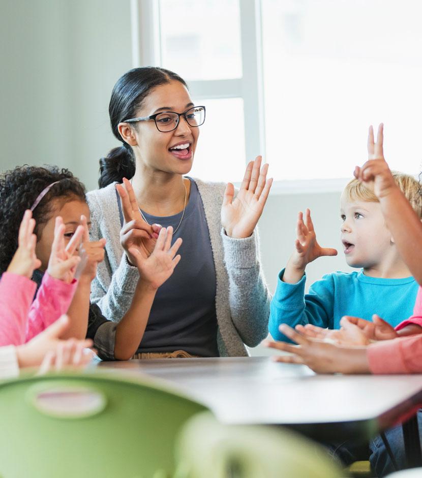 Elementary teacher working with students