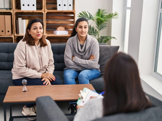 Counselor working with a family