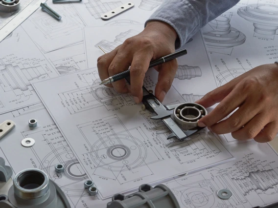 Engineer drafting mechanical parts