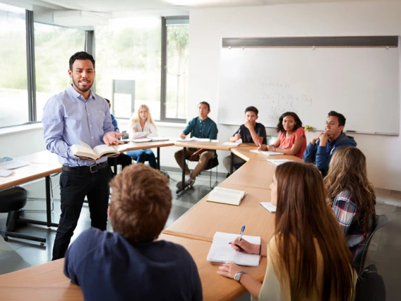 Teacher engaging with students in a classroom